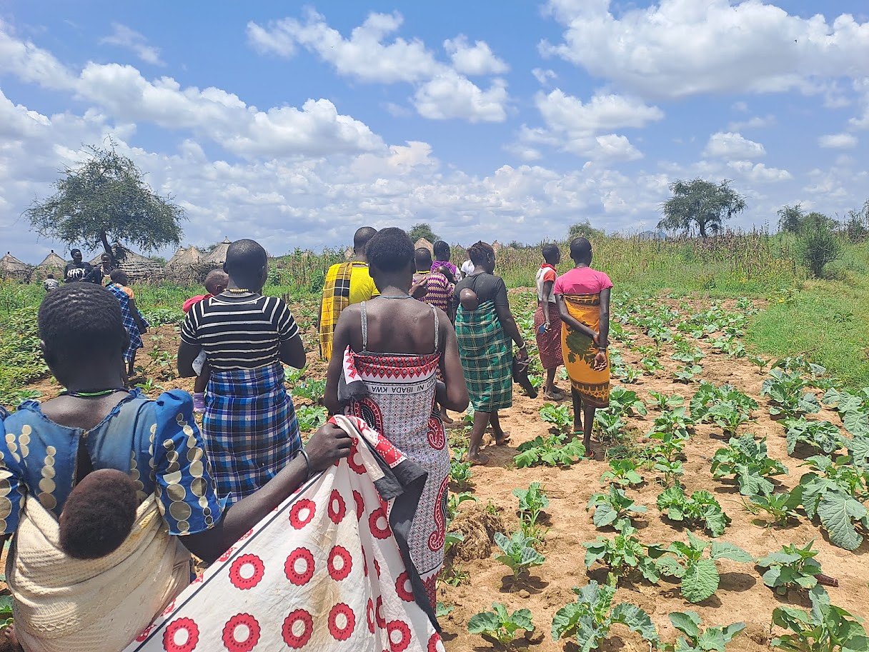 Women walking to the gardens